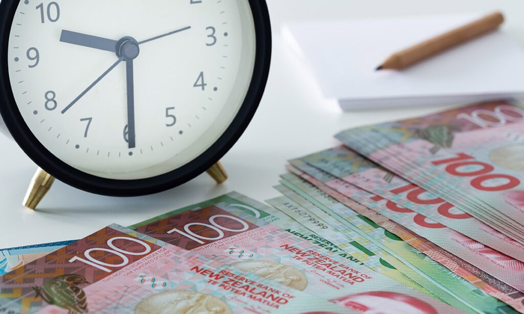 clock in front of piles of money for Fast Approval Loans