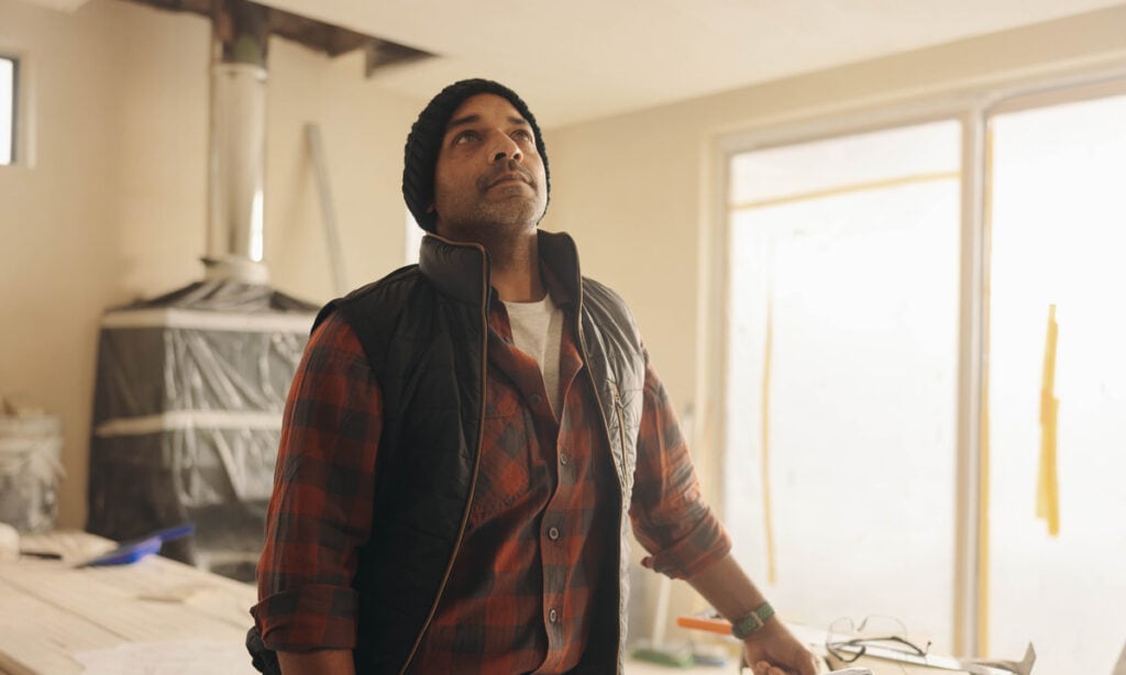 a man working on a home renovation