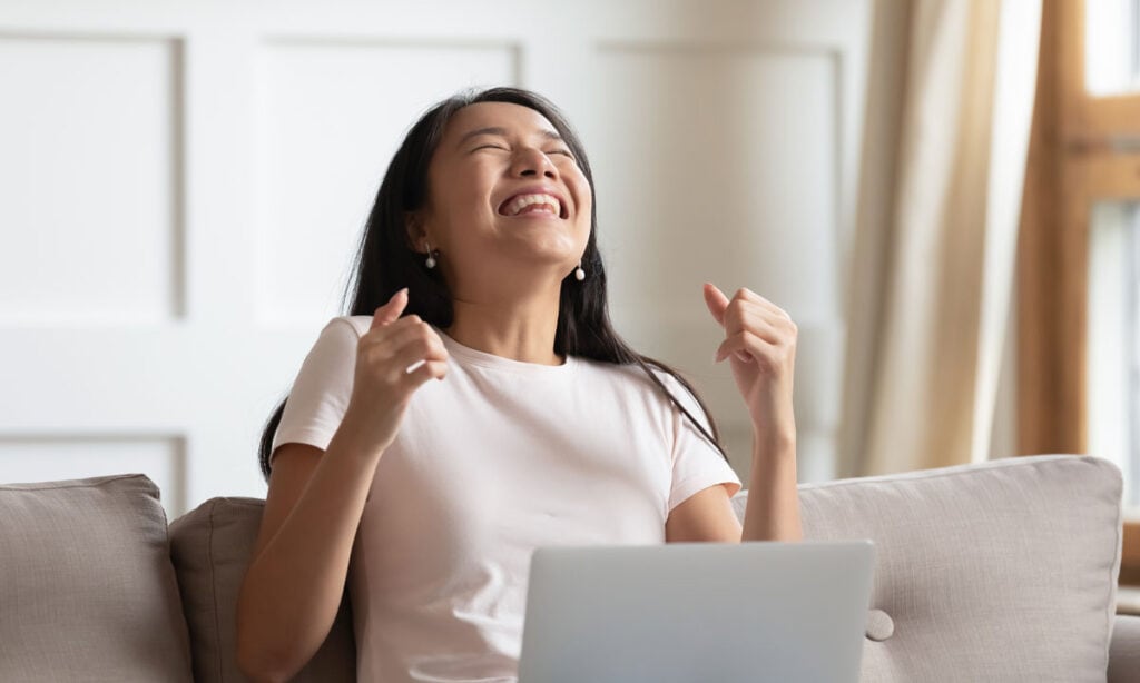 A woman excited about her loan