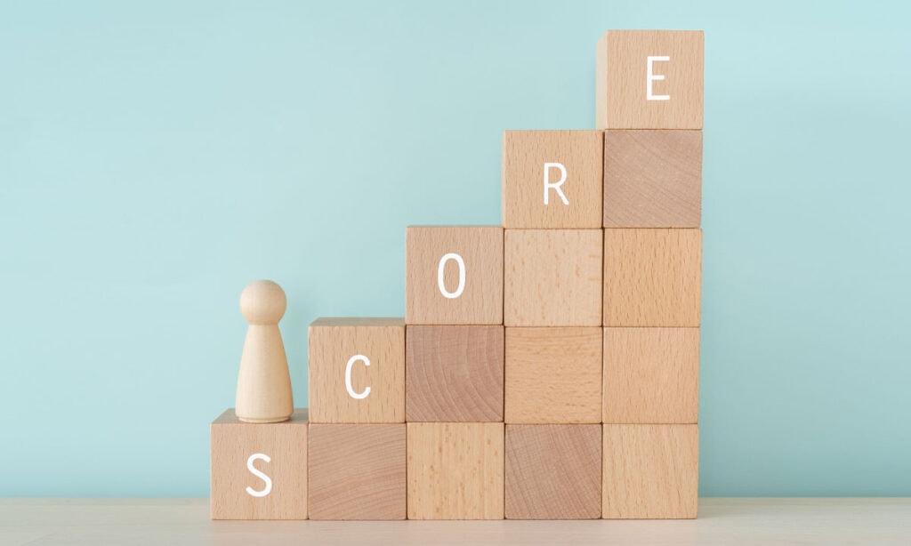 wooden blocks spelling out the word 'score'